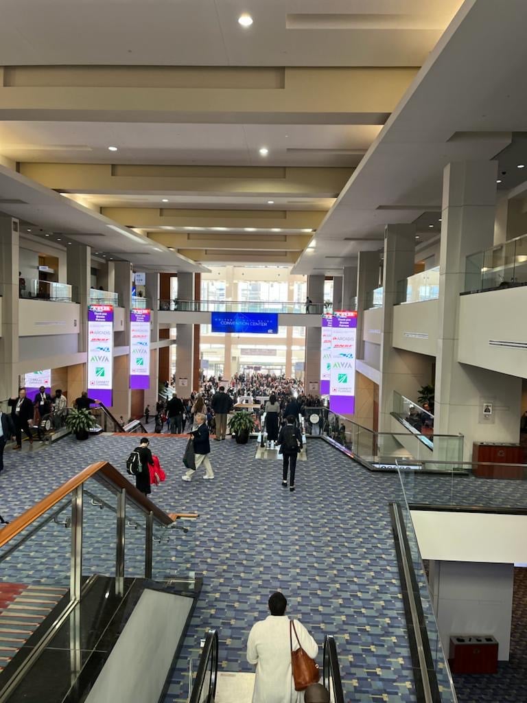 View at the crowd at TRB 2023 Annual Meeting showcasing road and street maintenance.